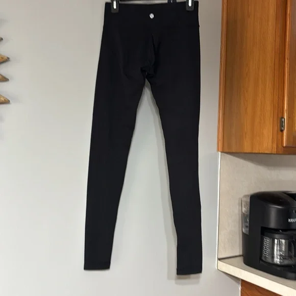 32.Lululemon Skinny Groove Pant in Black - Picture 6 of 7